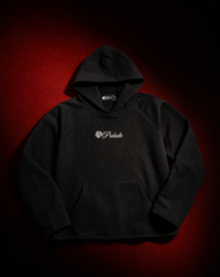 Heavyweight 500 GSM organic cotton French terry hoodie with embroidered branding, raglan sleeves, and raw hems. Slightly oversized. Made in USA.