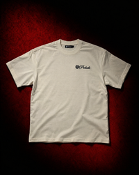 The PRELUDE Essential T-Shirt in natural with embroidered branding. A warm, off-white premium tee for everyday wear. Shop all colors.